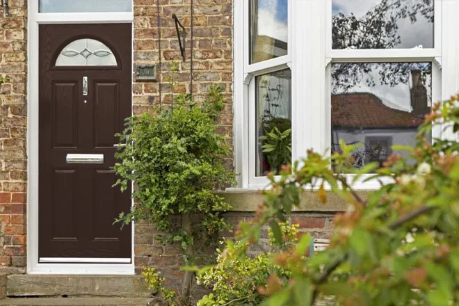 Brown Front Door With Bay Window