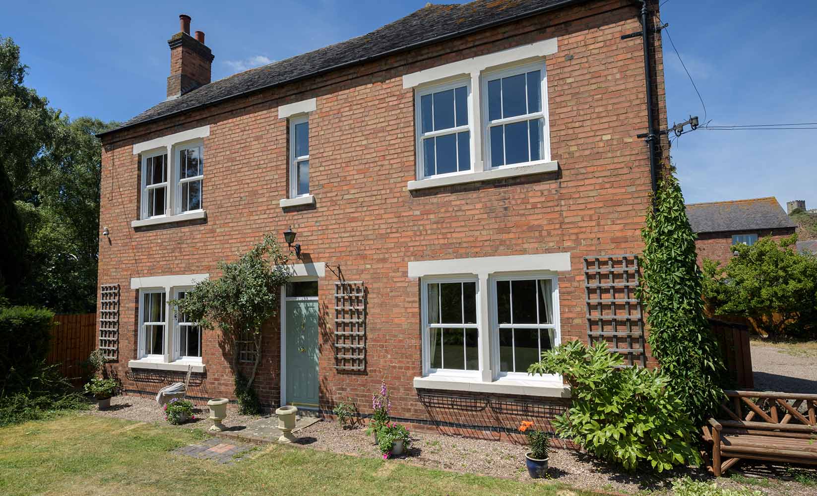 White Sash Windows On Whole House
